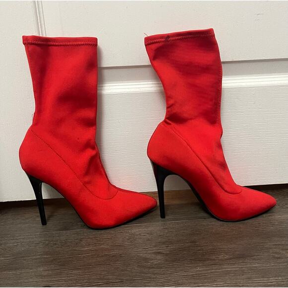 Woman's Bright red, pointed toe, sock boot, black heel. ￼ - Picture 2 of 4